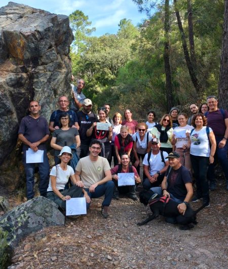 Group photo from the Los Molinos GeoTrail, with participants showing their field drawings