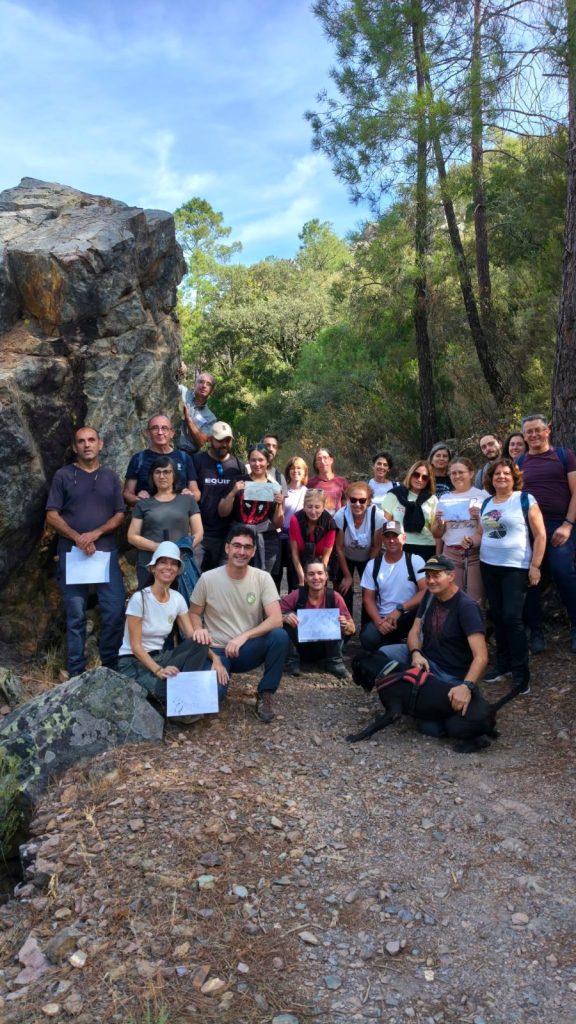 Group photo from the Los Molinos GeoTrail, with participants showing their field drawings